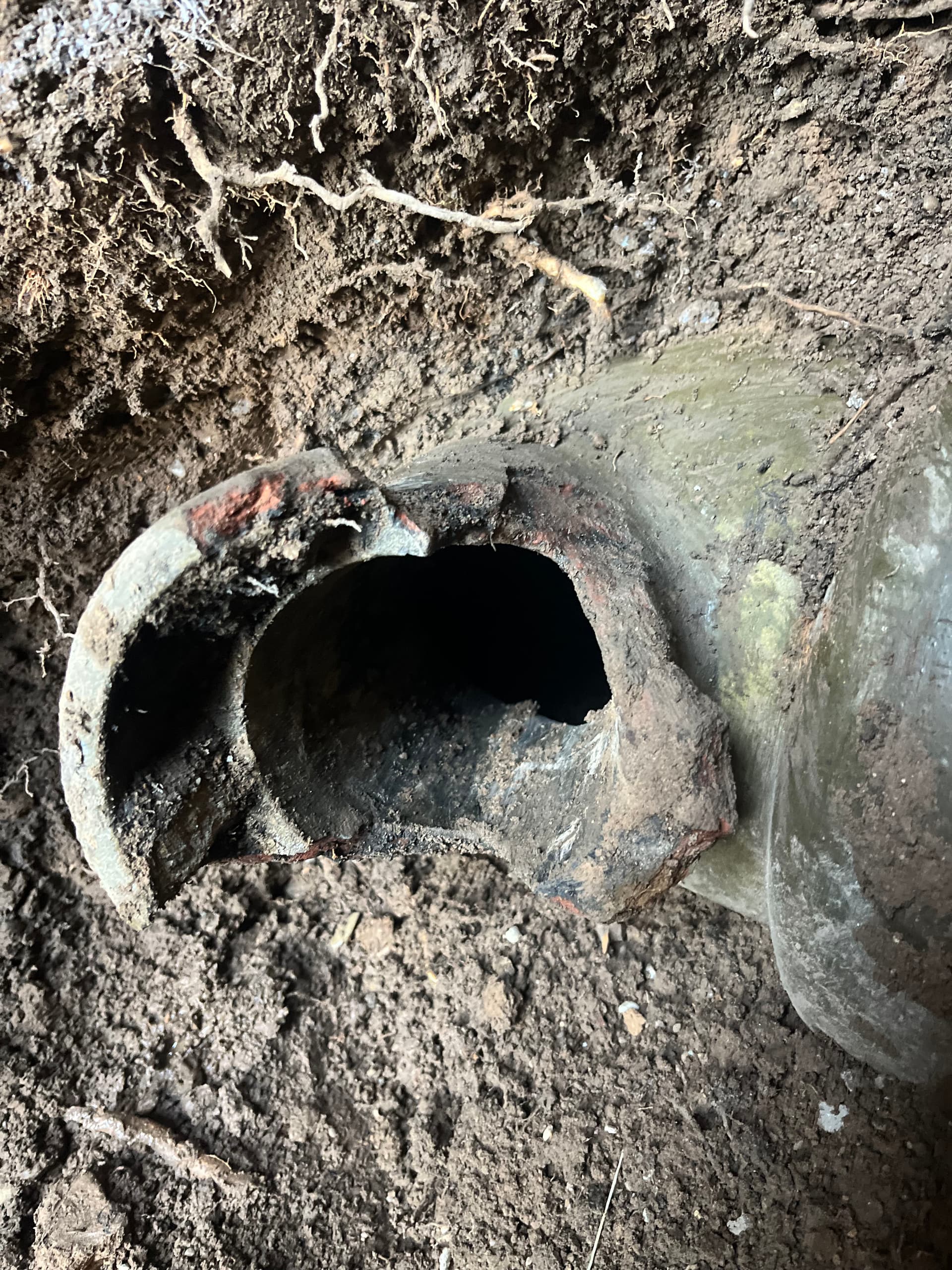 Gallery photos for Sewer Line Repair After Fiber Optic Crew Struck Underground Pipe: Image #1