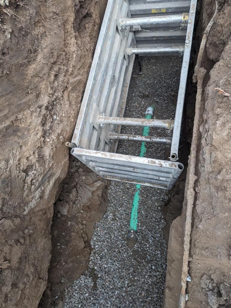 Sewer Line Repair After Fiber Optic Crew Struck Underground Pipe image