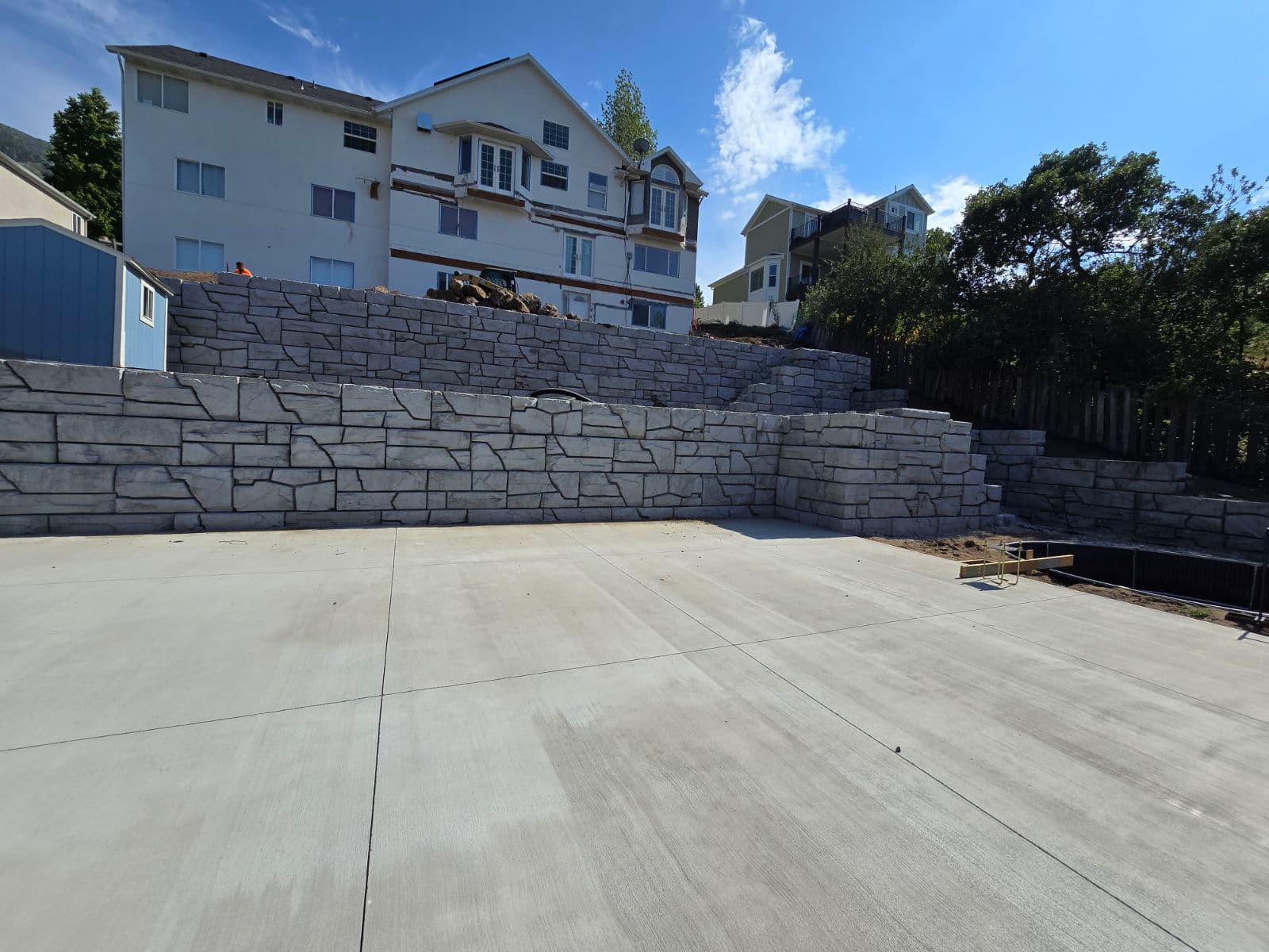 Gallery photos for Tiered Stone Retaining Walls Built to Handle Serious Slopes: Image #1