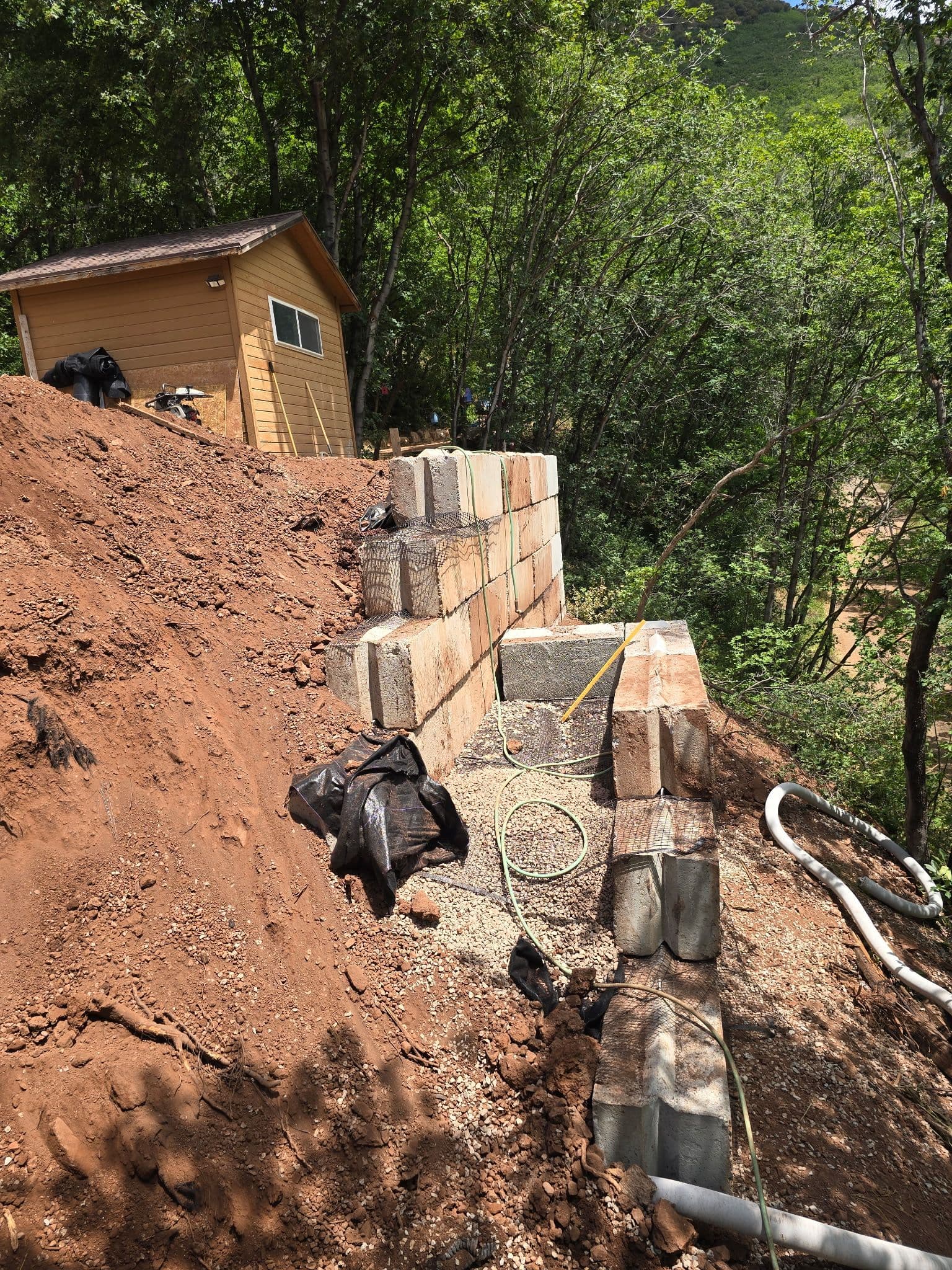 Gallery photos for Massive Concrete Block Retaining Wall Built for a Cabin-Area Slope: Image #1